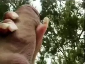 Busty Latina gives a wet blowjob by the pool