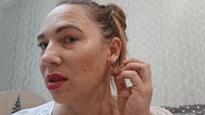 Two earrings in one ear a