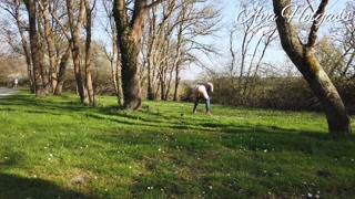 MILF flashing off her big butt to truckers