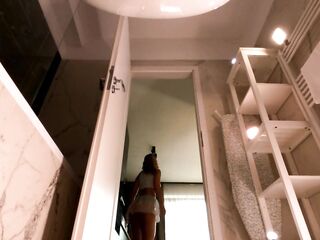 Braless large titties large butt greatly sexy and cute cutie in short miniskirt flashes her large ass in the bath