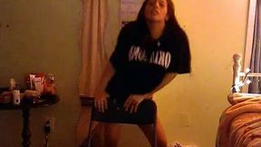 Sexy brunette is dancing like wild and shaking her ass