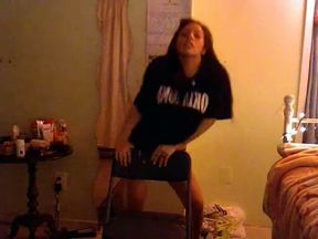 Sexy brunette is dancing like wild and shaking her ass