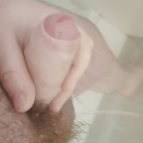 Fat hairy guy wanking and cum shot and playing with fat moobs in shower