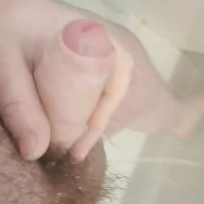 Fat hairy guy wanking and cum shot and playing with fat moobs in shower