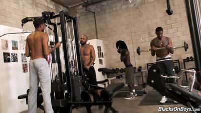 Interracial gay gangbang in the private gym