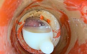 The Camera 4K Inside the Deep Pussy Records a Huge Ejaculation with a Stuck Condom