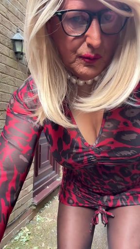 Thrilling moment from &quot;Sexy Crossdresser kellycd2022 in red animal print dress and heels getting ready for a drive out&quot;