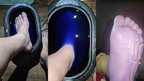 pov dipping foot in paraffin view