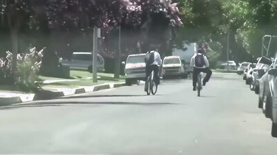Two hung dudes take turns riding their bike and getting their assholes stretched by a busty blonde babe