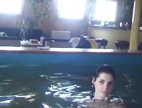 Skinny girl shows her sexy body near the pool
