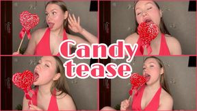 Hotly sucking a huge lollipop