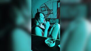 Bombshell stepsister smokes a cigarette