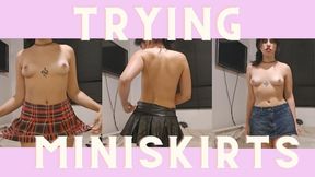 Try on miniskirts topples