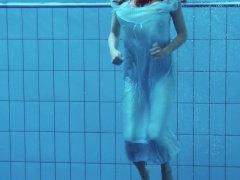 Hot teen unterwasser swims and strips