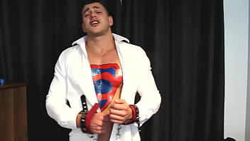 Sexy Lycra Superman Muscle Hunk Defeated To Cum