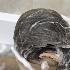 Hair washing in the bath