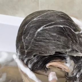 Hair washing in the bath