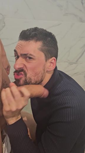 Hot daddy sucking twink big cock in a public bathroom