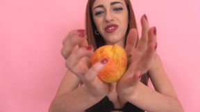 Valerie destroys fruit with her finger