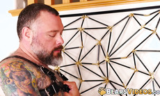 Angel Ferrari feeds hairy leather daddy Kurt Jacobs his big raw cock before taking his load