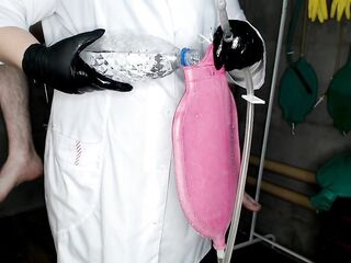 Chunky gorgeous nurse gives a 1.5 liter enema bag to the patient