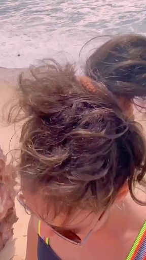 public beach drinking 2 liters of pee ,public beach gagging   Clip 1