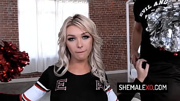 Stunning trans cheerleader Aubrey Kate takes two cocks at same time