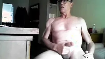 Mature daddy bear strokes his big amateur cock on webcam