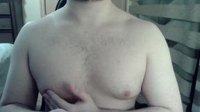Muscular camboy flexes his muscles and squats