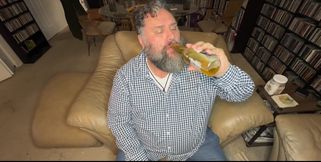 Relaxing with a Cold One and a Hot Cock