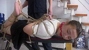 Slender Asian Girl With Sexy Legs Is Introduced To Bondage