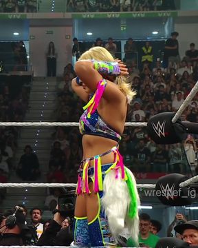 Tanned blonde celebrity wrestles in a Japanese match