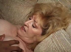 Sexy granny gets fucked by a black dude