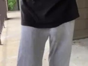 Freeballing in grey sweats showing VPL