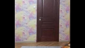 Crossdresser smokes and poses in long tight dress