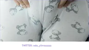 German MILF plays with her big natural tits in pajamas
