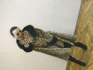 Oriental Sissy Ladyboy in Hot Leopard Coat and Leopard Dress and in High Heels Showing her Hawt Body