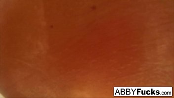 Abigail takes a quick shower and shaves her pussy