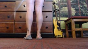 Gray ballet flats standing shoe play