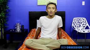 Asian twink strips naked and masturbates after an interview with passion