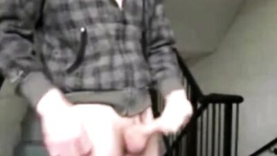 Nerdy guy is smelling his own pants and playing with that cock