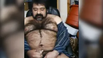 Hairy bear daddy strokes his thick uncut cock in solo webcam session