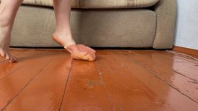 crushing chicken on old wooden floor