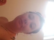 Tatted babe smokes cigarette in bubble bath