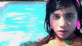 Tobie teen 18+ masturbating outdoors by the pool