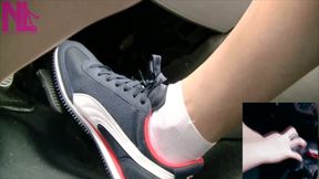 Driving in Blue Nike Sneakers and White Socks