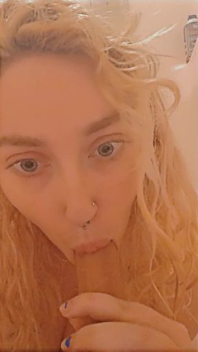 Kitten gives dildo head in the shower hot and steamy