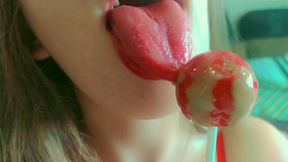 talk dirty to me your cute baby girl sucking a lollipop, close up mouth begging u to give me your load