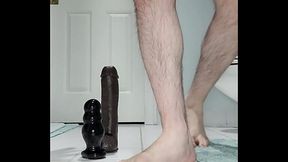 Caged twink rides black cock dildo