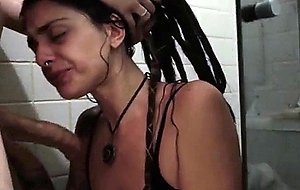Dreadlocked beauty blows guy in shower